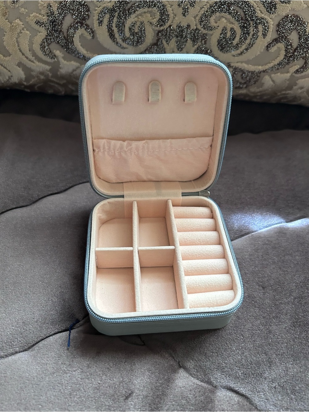 Compact Blue Jewelry Organizer Case with Soft Pink Interior